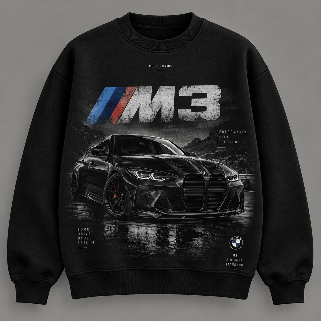 A black crewneck sweatshirt featuring a large graphic print of a black BMW M3 car on a wet road, with the 'M3' logo and 'Dial Theory' branding printed on the front.